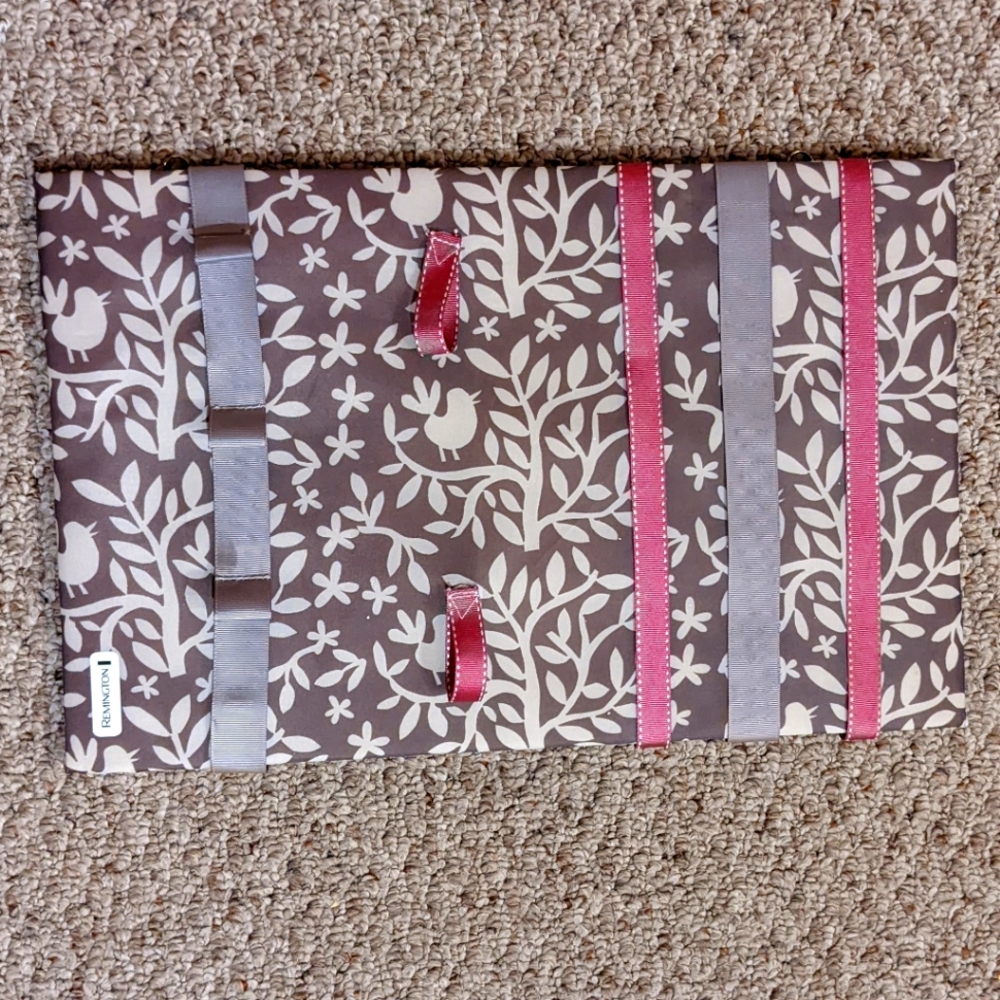 Remmington Hair Accessories Storage Board in gray with pink and white